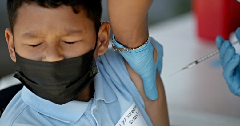 child receiving vaccine